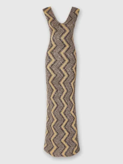 Abito lungo zig zag con profonda scollatura e paillettes