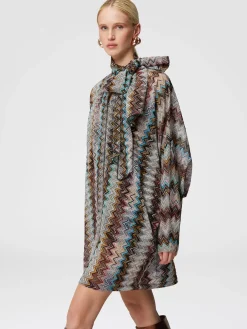 Abito zig zag lamé con collo foulard