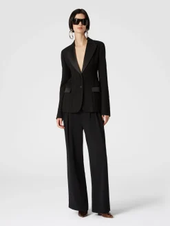 Blazer chevron con dettagli in raso
