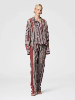 Blusa con collo foulard in viscosa lamé