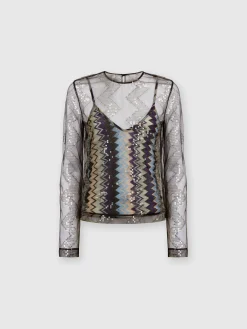 Blusa doppiata in tulle con paillettes