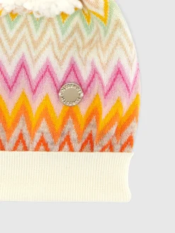 Cappello in lana zig zag con pon pon