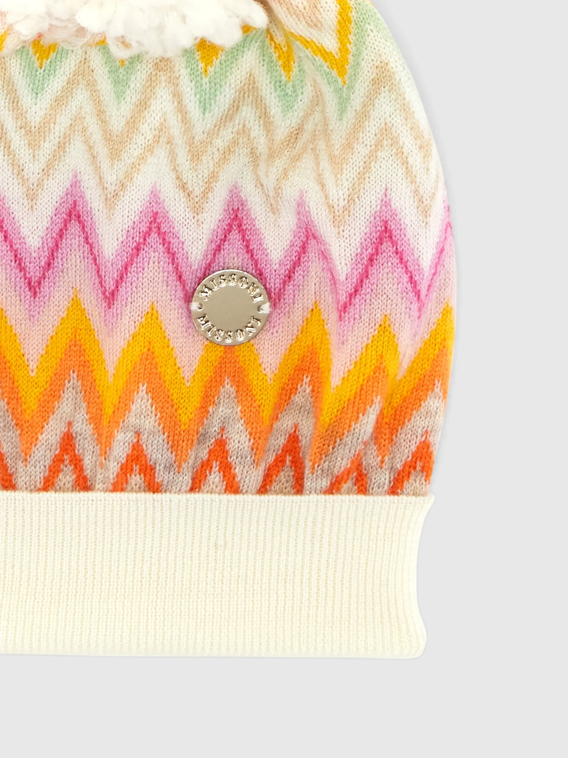 Cappello in lana zig zag con pon pon