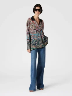 Cinque tasche in denim con inserto in maglia