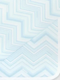 Coperta in cotone stretch zig zag con scritta logo