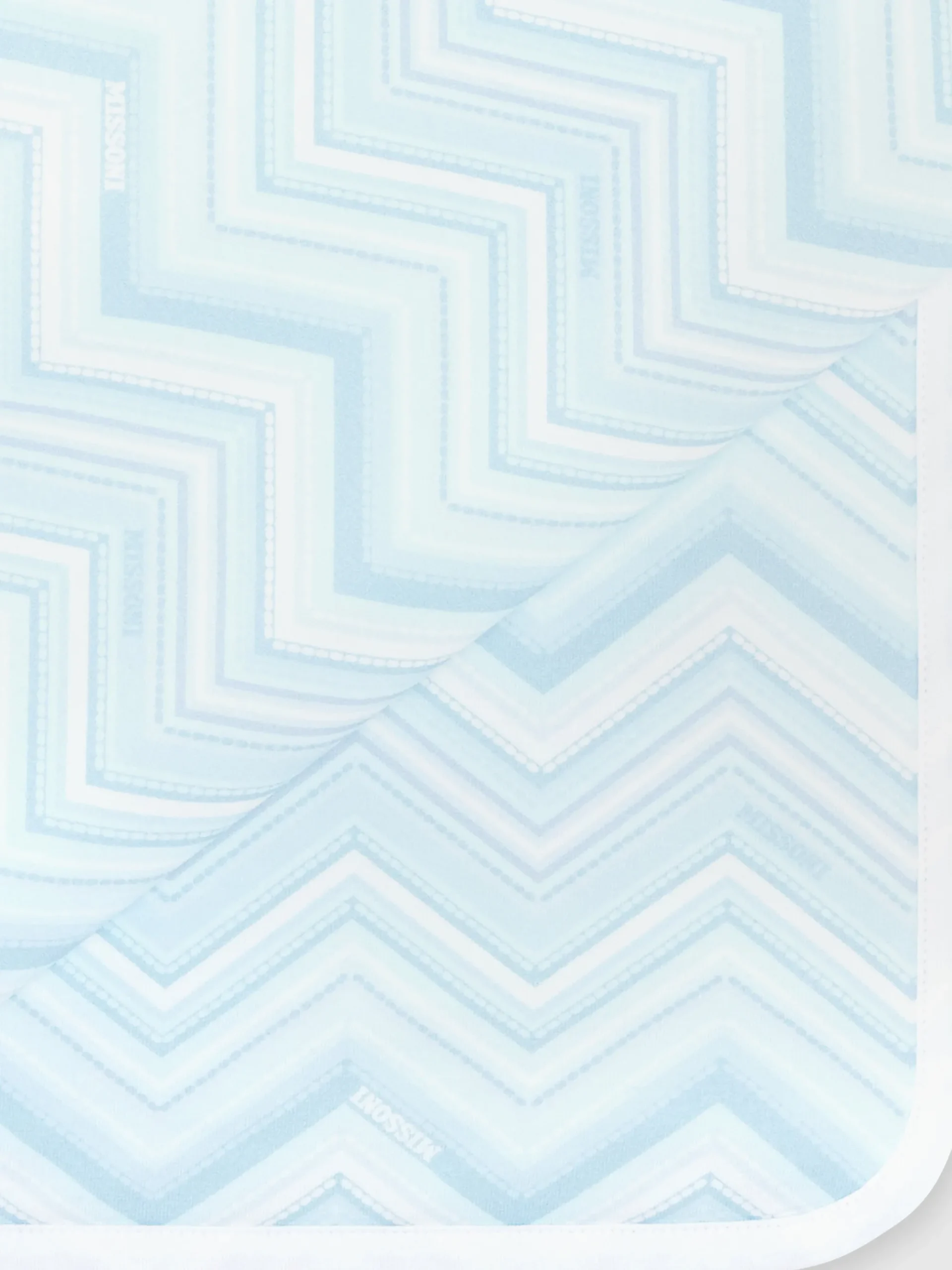 Coperta in cotone stretch zig zag con scritta logo