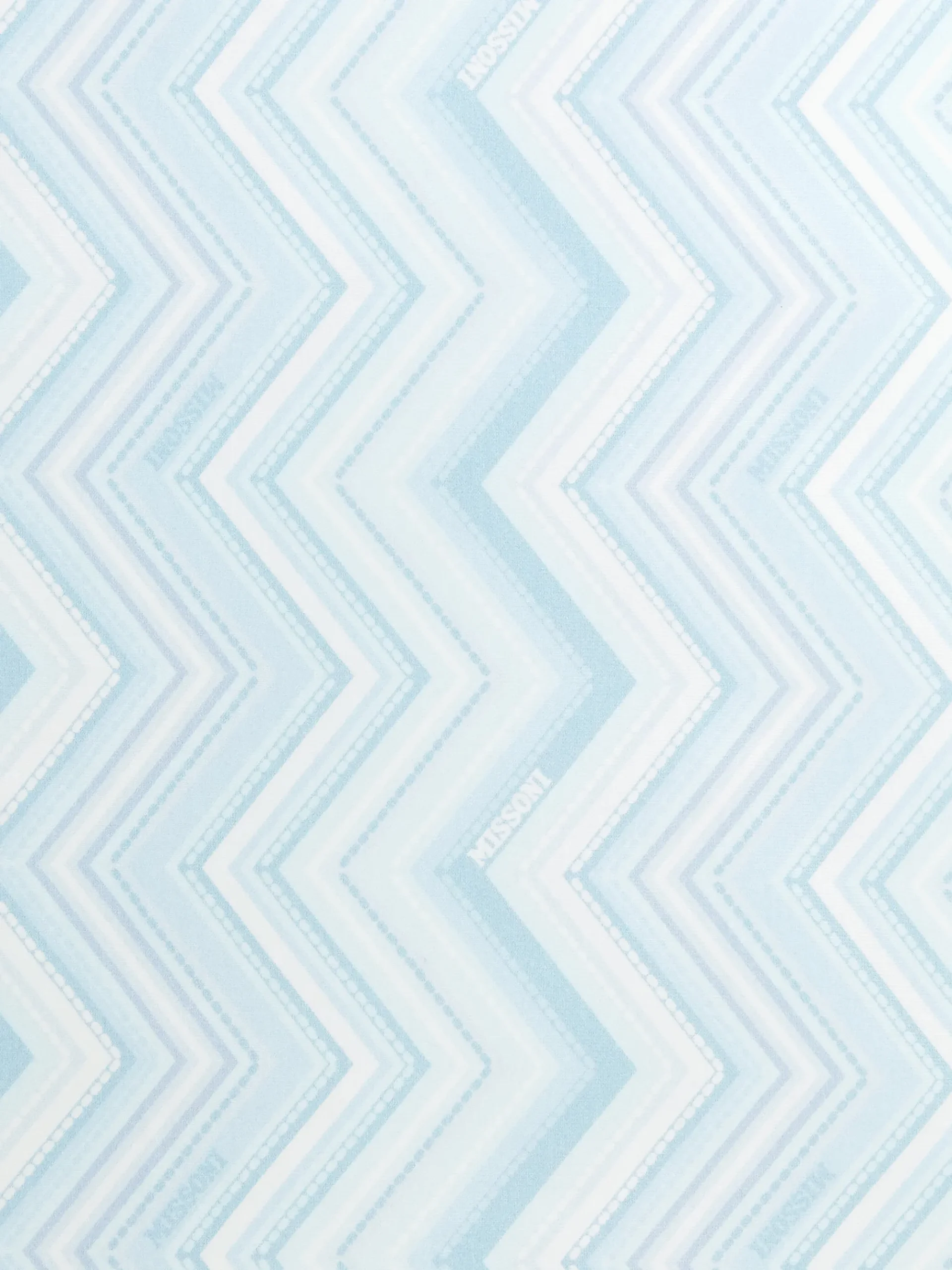Coperta in cotone stretch zig zag con scritta logo