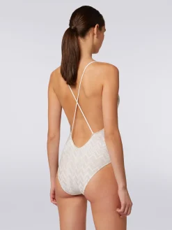 Costume intero con chevron tono su tono lamé