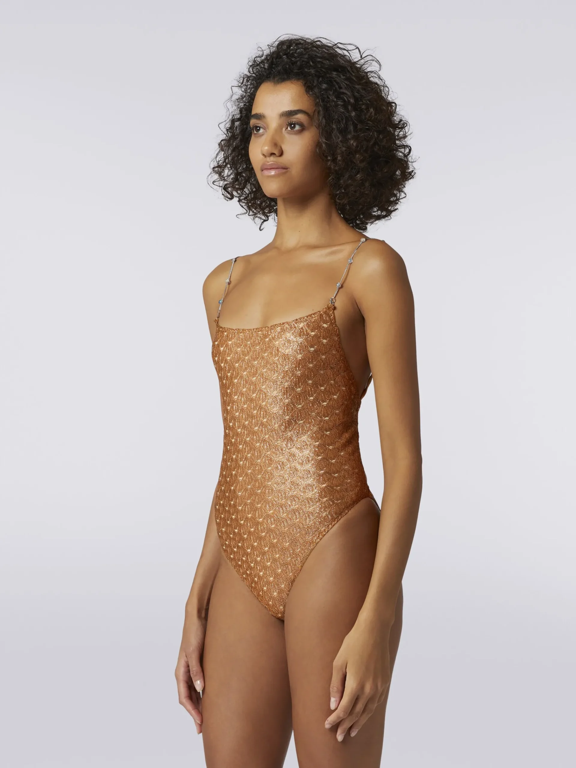 Costume intero effetto pizzo con spalline in catena e pietre