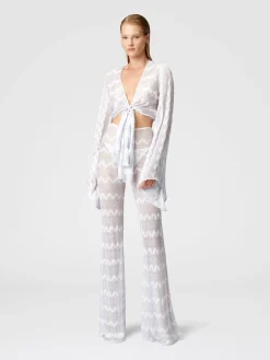 Crop top con maniche ampie e nodo frontale in viscosa zig zag lamé