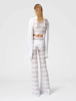 Crop top con maniche ampie e nodo frontale in viscosa zig zag lamé