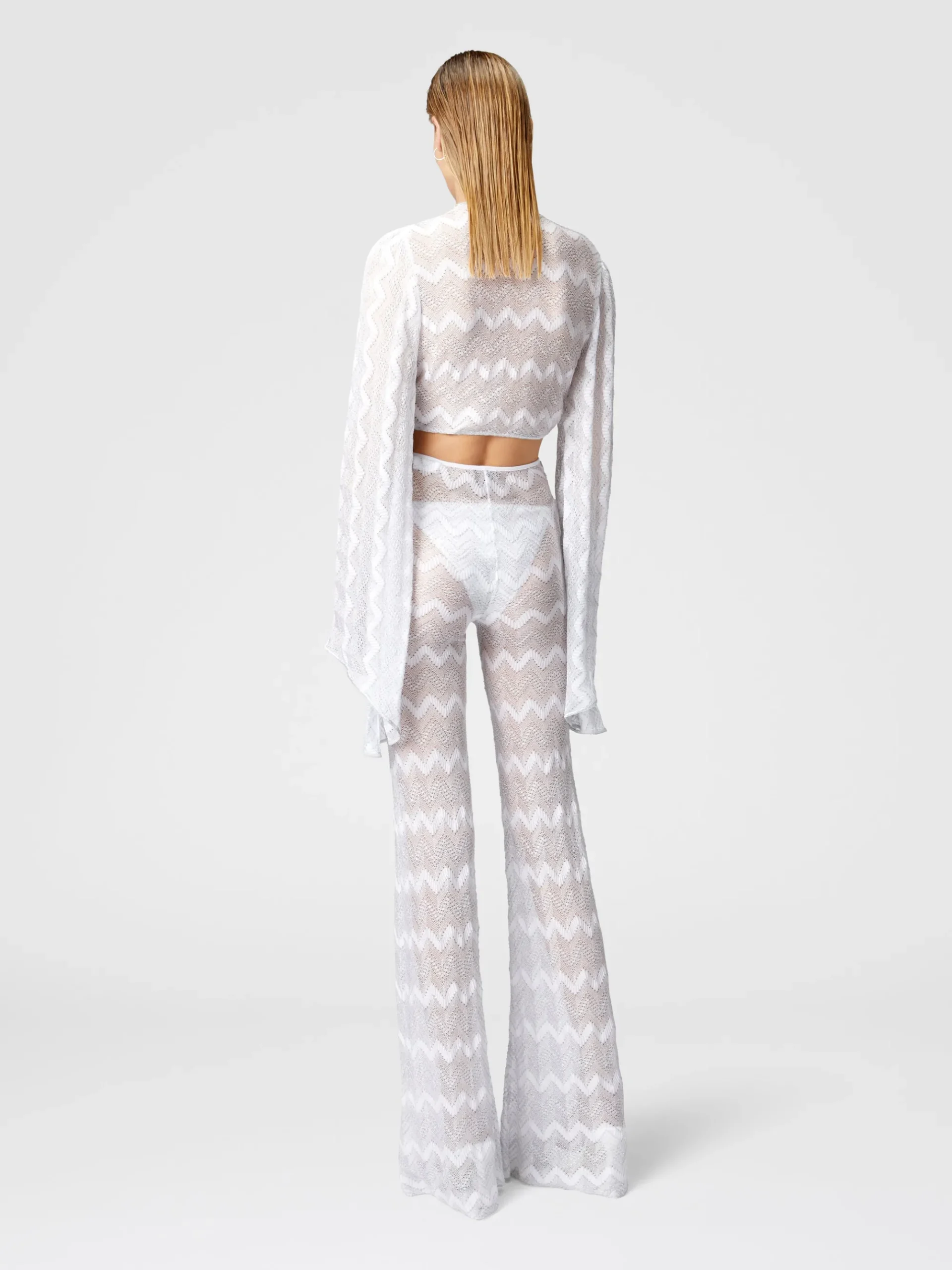 Crop top con maniche ampie e nodo frontale in viscosa zig zag lamé