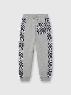 Joggers in cotone con inserti zig zag