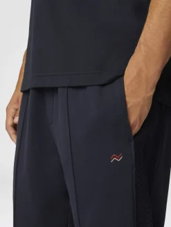 Joggers in cotone con ricamo zig zag