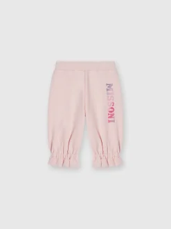 Joggers in cotone con rouches sul fondo e logo