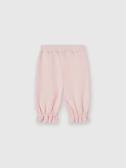 Joggers in cotone con rouches sul fondo e logo