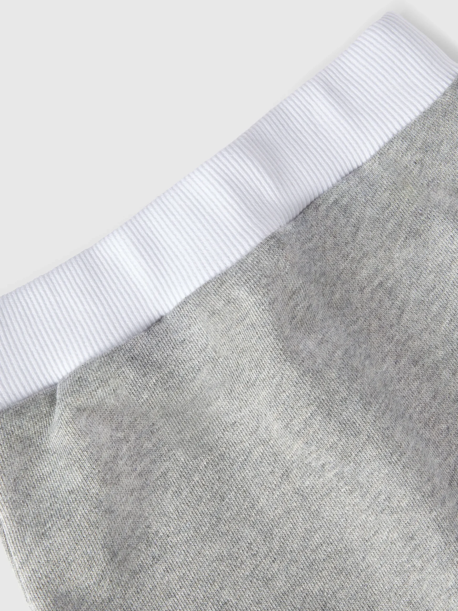 Joggers in cotone con stampa logo a rilievo