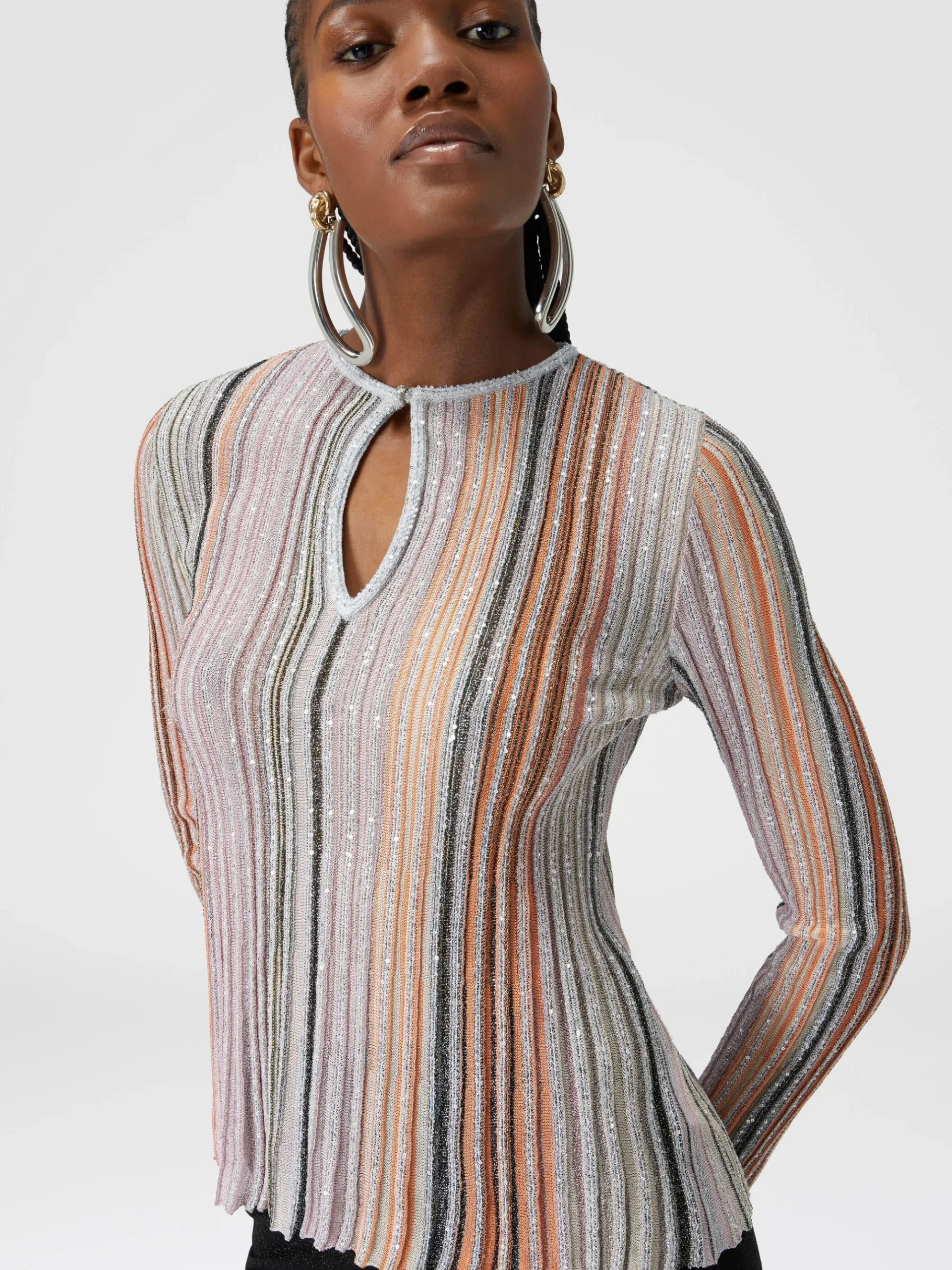Maglia a costine parzializzate con paillettes