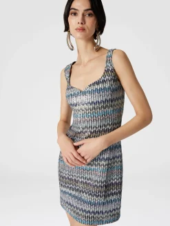 Mini-abitoin maglia lamé con scollatura a cuore