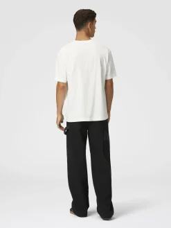 Pantaloni cargo in denim con inserti in maglia chevron