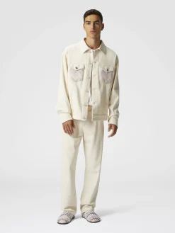 Pantaloni classici in denim con inserti in maglia chevron