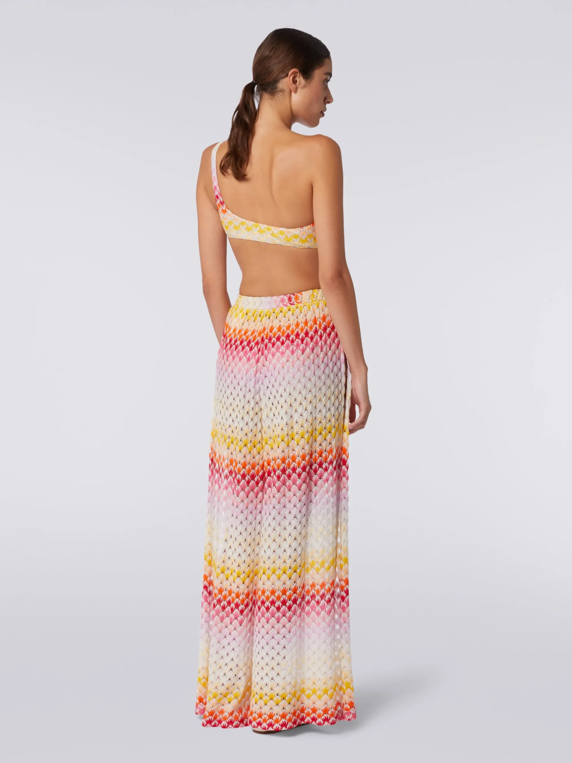Pantaloni copricostume effetto pizzo con lurex