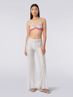 Pantaloni copricostume effetto pizzo con fondo svasato