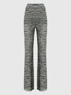 Pantaloni flare in maglia fiammata con paillettes