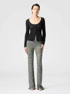 Pantaloni flare in maglia fiammata con paillettes