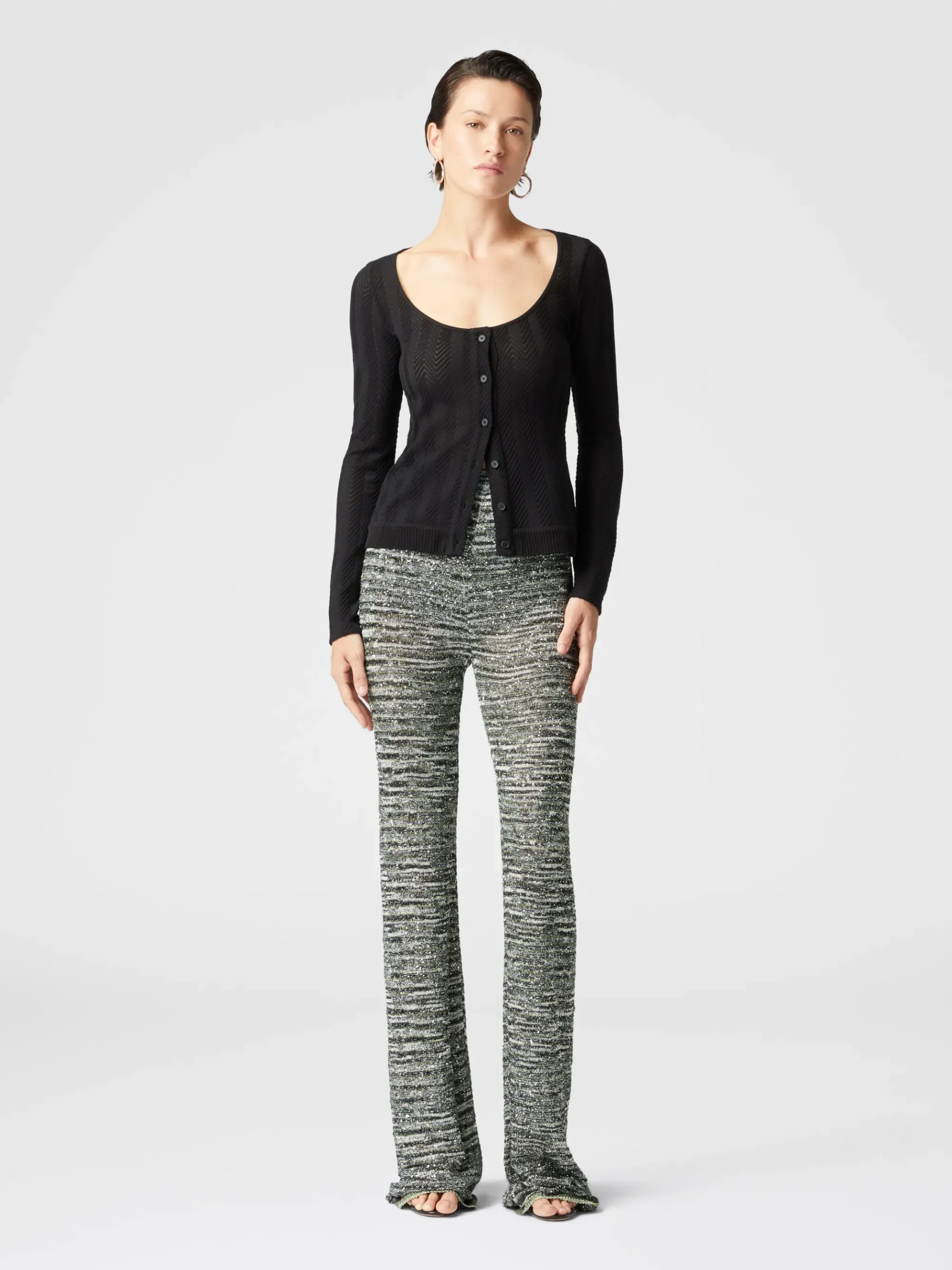 Pantaloni flare in maglia fiammata con paillettes