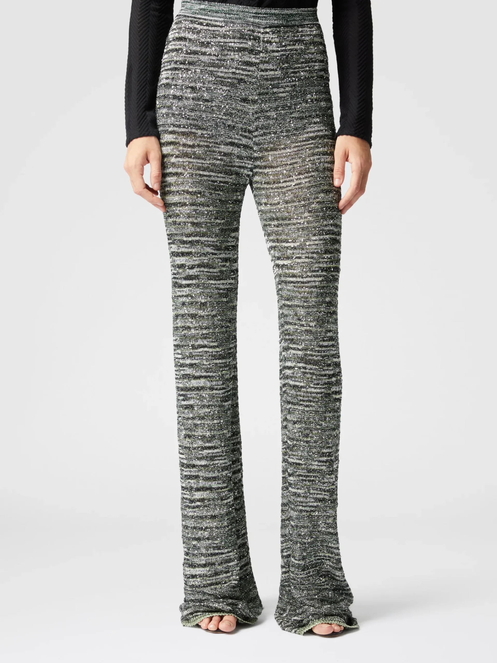 Pantaloni flare in maglia fiammata con paillettes