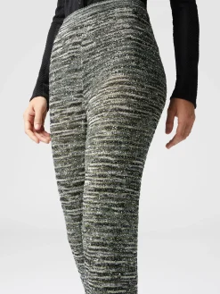 Pantaloni flare in maglia fiammata con paillettes