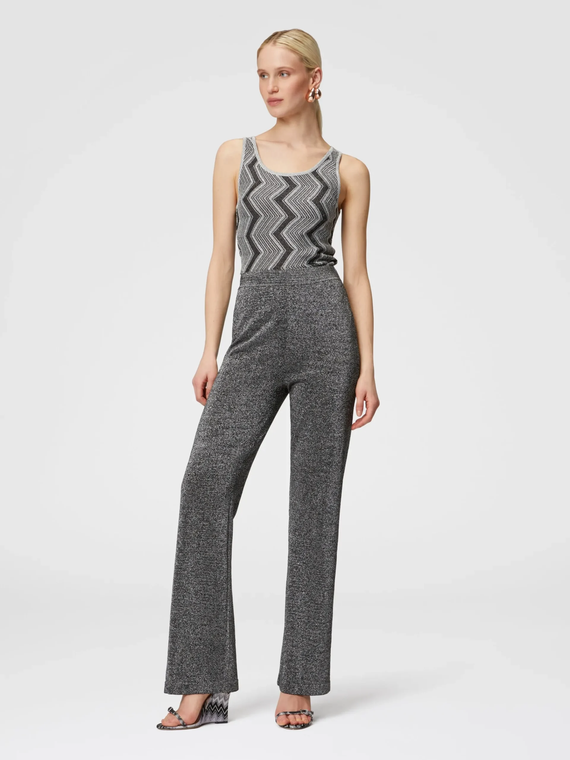 Pantaloni flare in viscosa effetto glitter