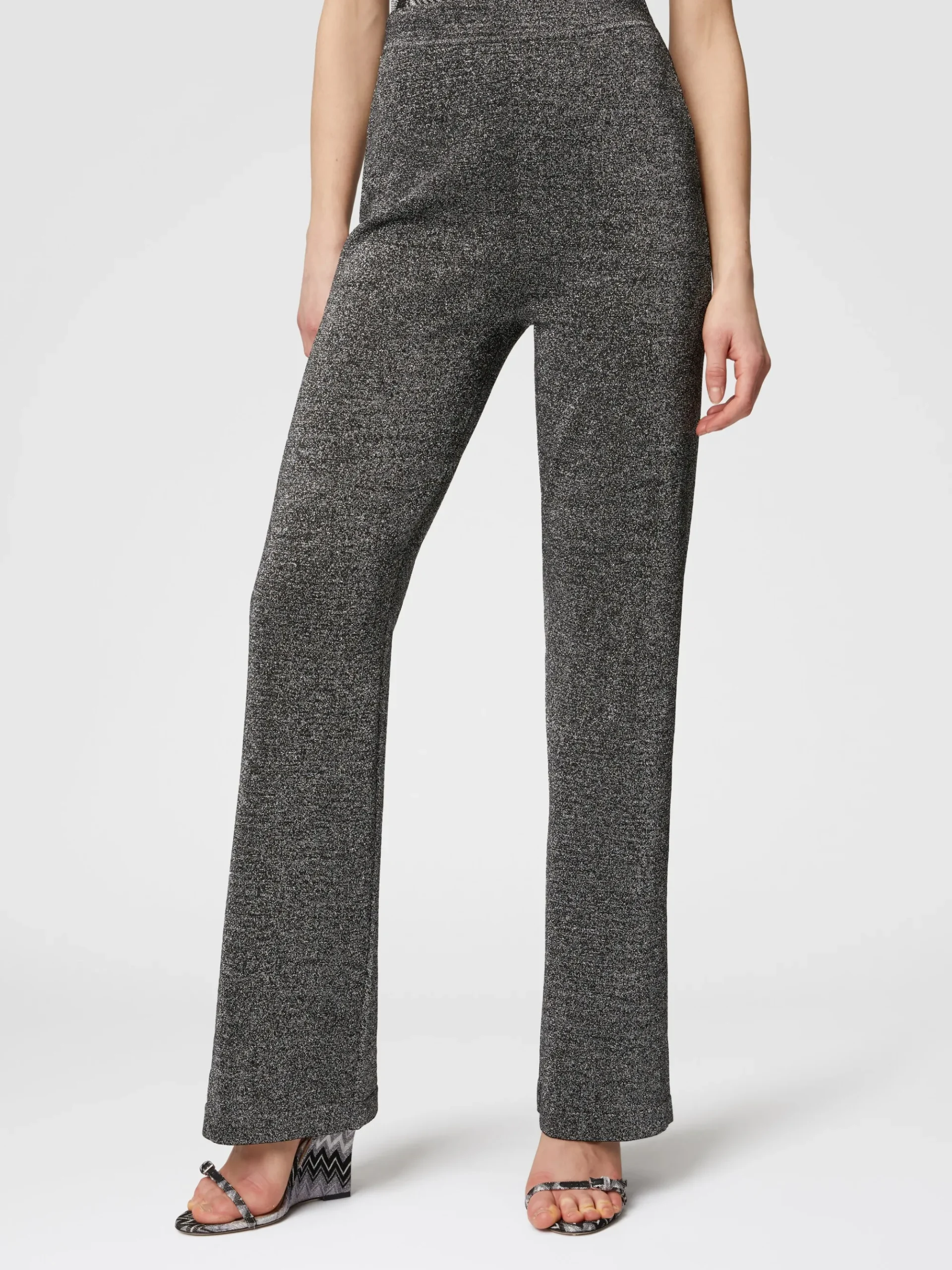 Pantaloni flare in viscosa effetto glitter