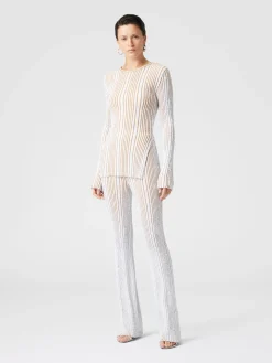 Pantaloni flare stretch a costine con paillettes