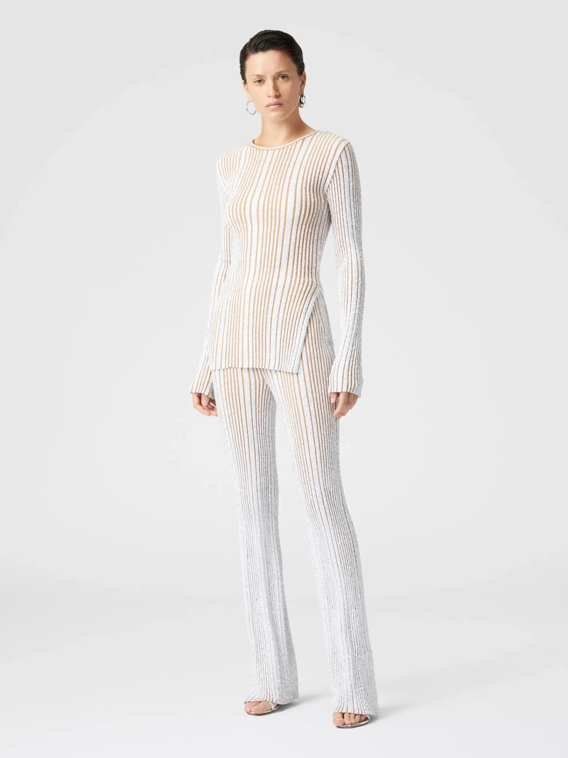 Pantaloni flare stretch a costine con paillettes