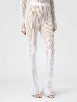 Pantaloni flare stretch a costine con paillettes