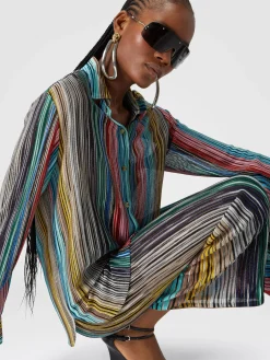 Pantaloni in maglia a costine fiammata con paillettes