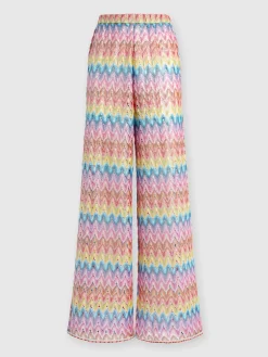 Pantaloni in pizzo di misto cotone spalmato
