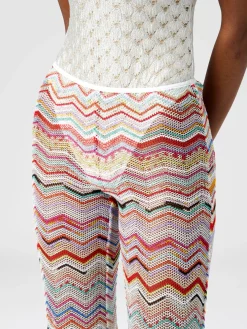 Pantaloni svasati in crochet zig zag con lurex