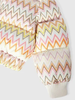 Piumino in nylon zig zag con cappuccio