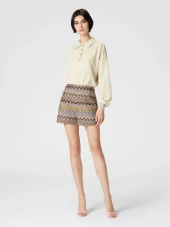 Polo a maniche lunghe con chevron tono su tono