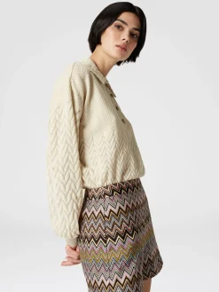 Polo a maniche lunghe con chevron tono su tono