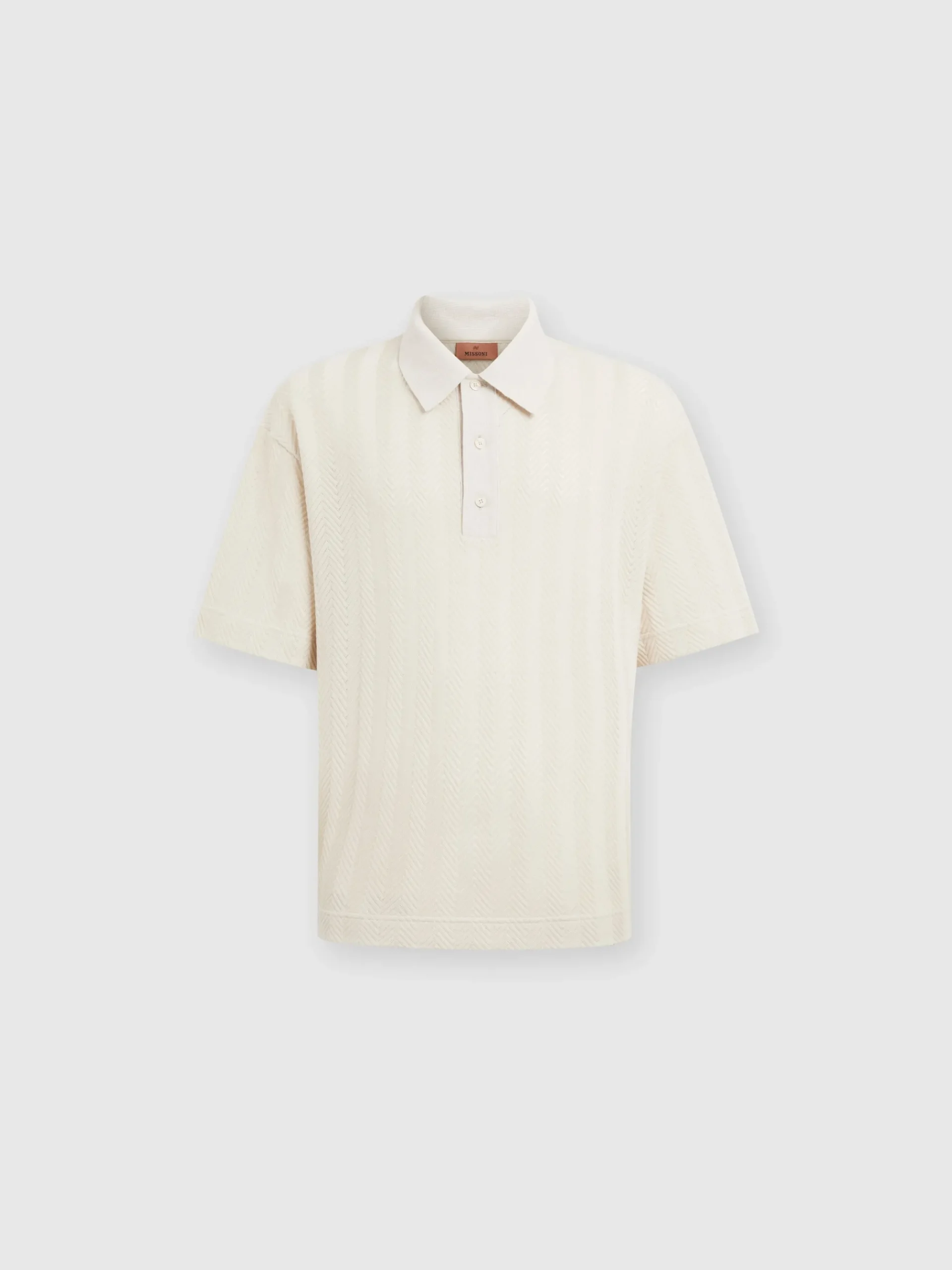 Polo in maglia boxy fit con chevron tono su tono