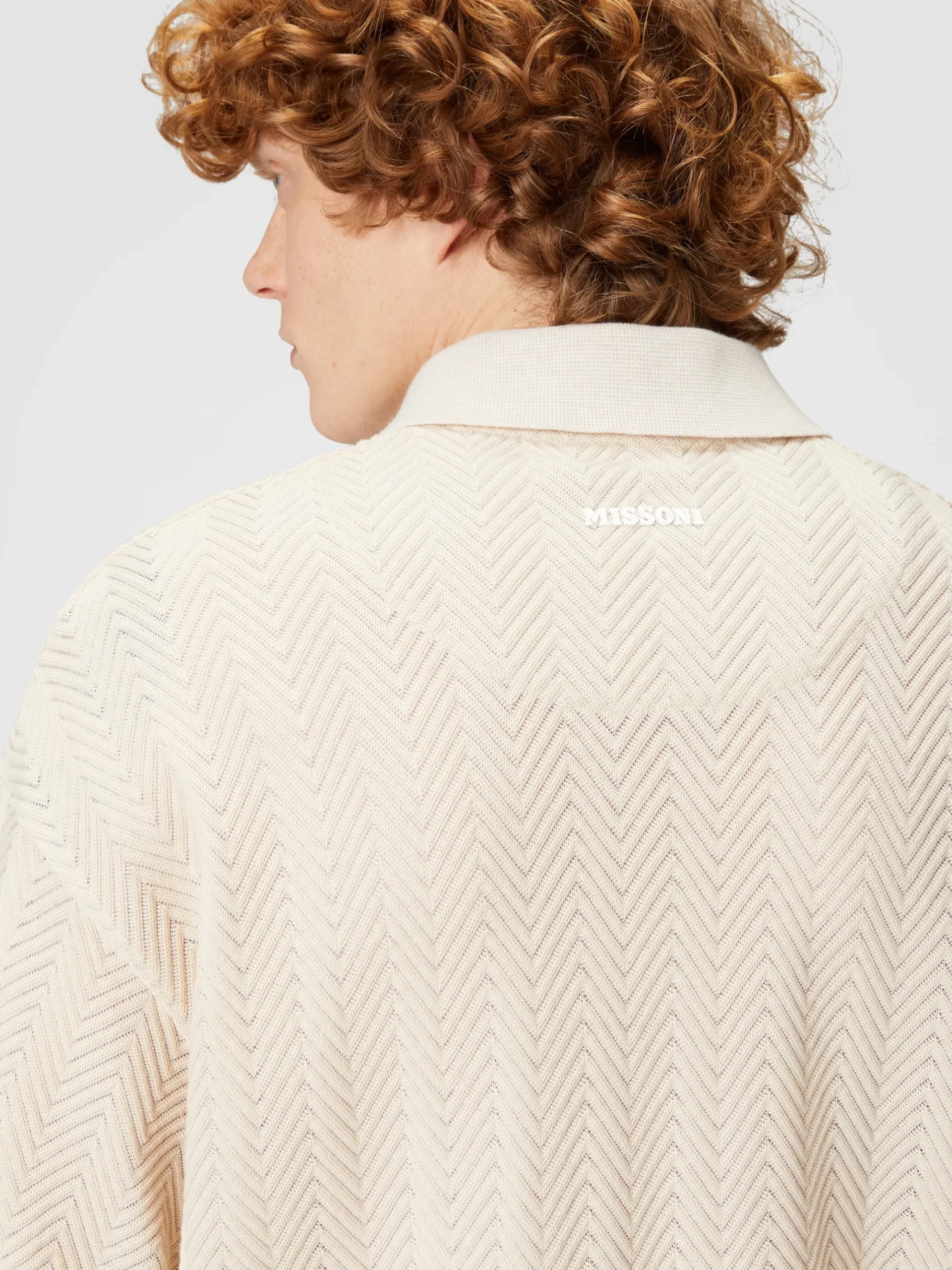 Polo in maglia boxy fit con chevron tono su tono