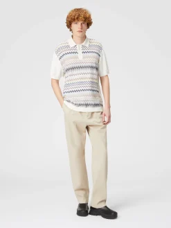 Polo in maglia di cotone zig zag con inserti tinta unita