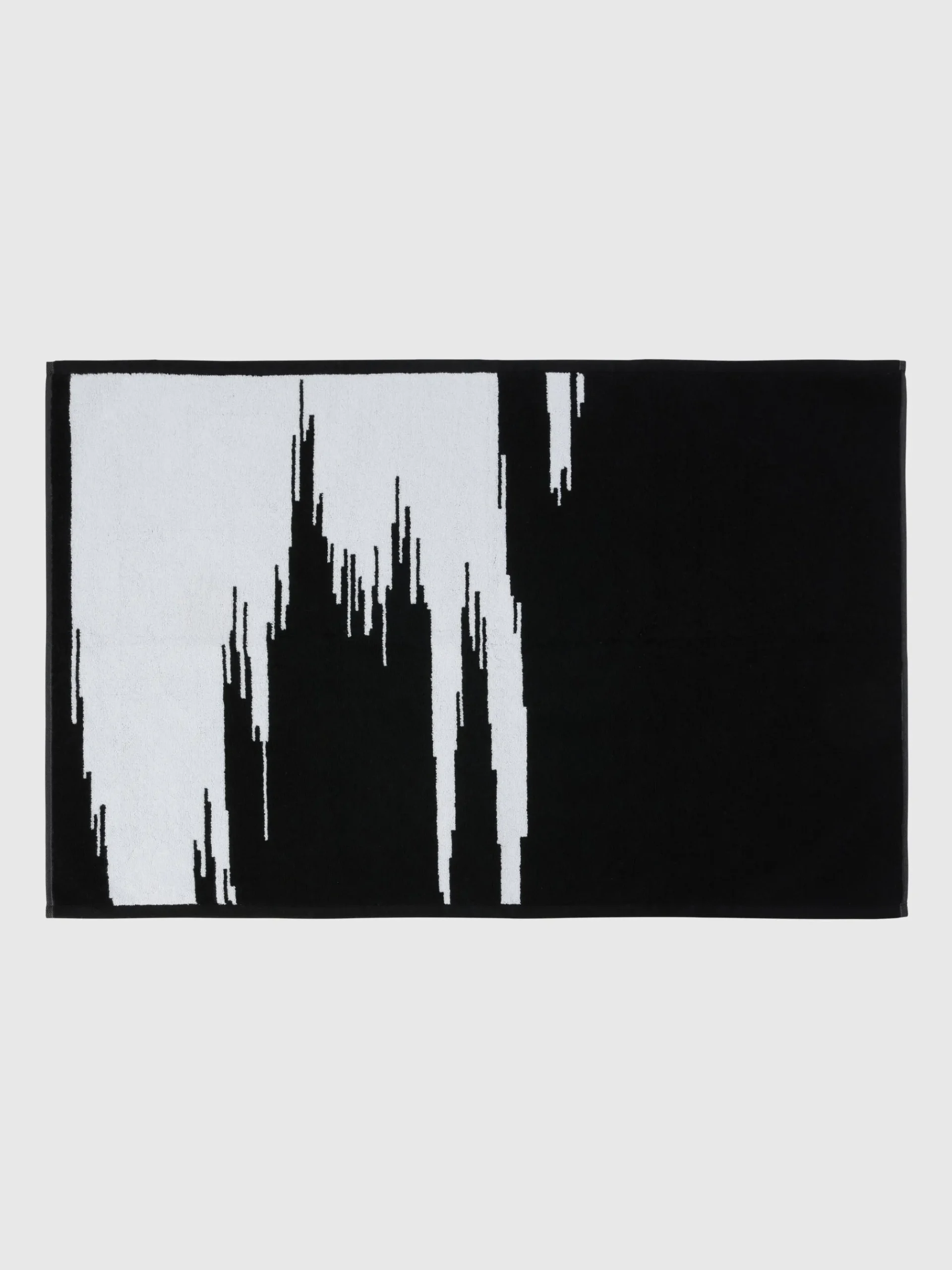 Tappetino da bagno Skunk 60x90 cm in cotone fiammato