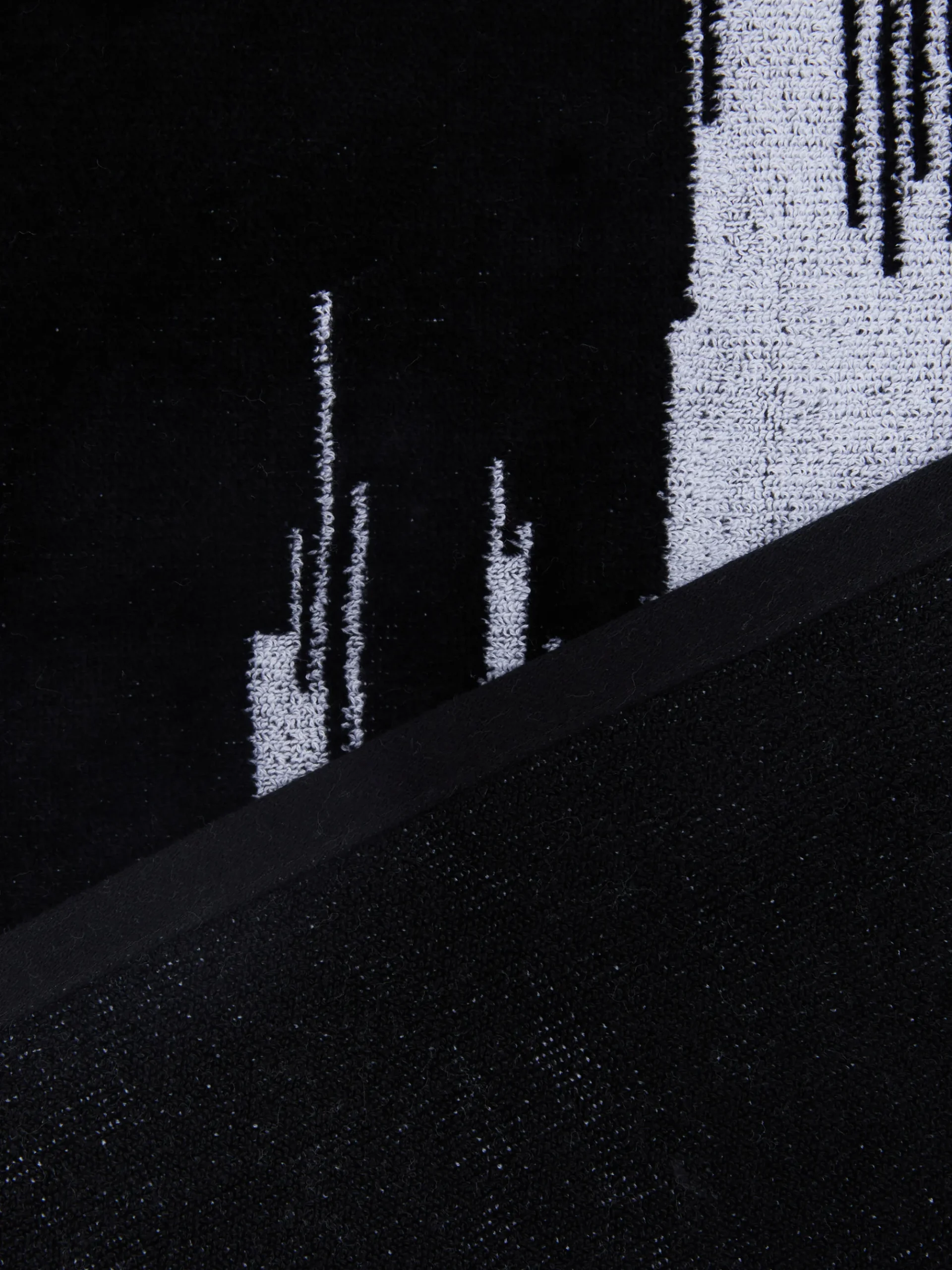 Telo mare 180x100 cm Skunk in spugna di cotone fiammata