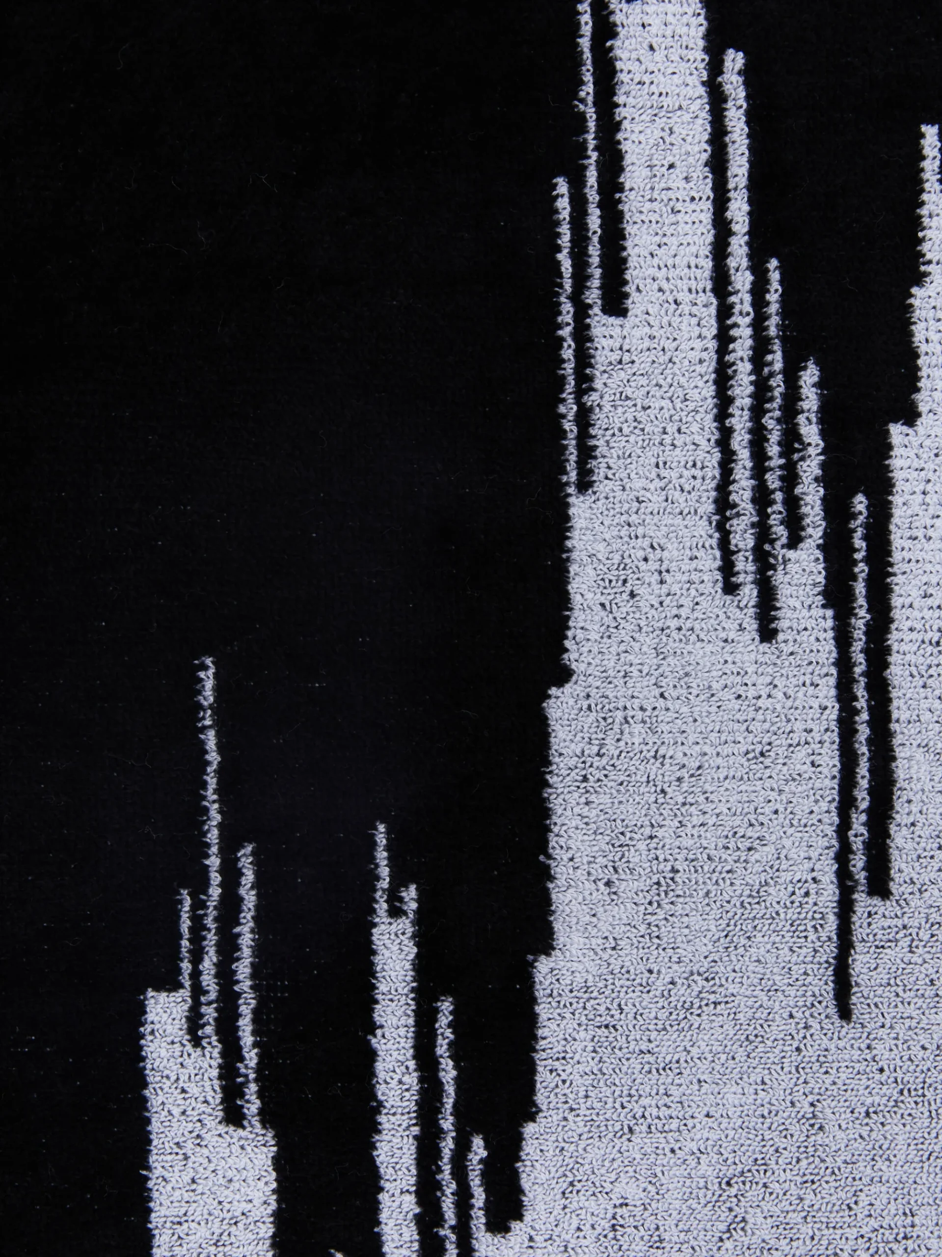 Telo mare 180x100 cm Skunk in spugna di cotone fiammata