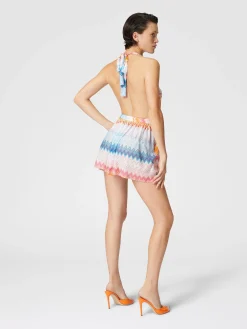 Tuta corta in misto viscosa zig zag lamé con scollo a V
